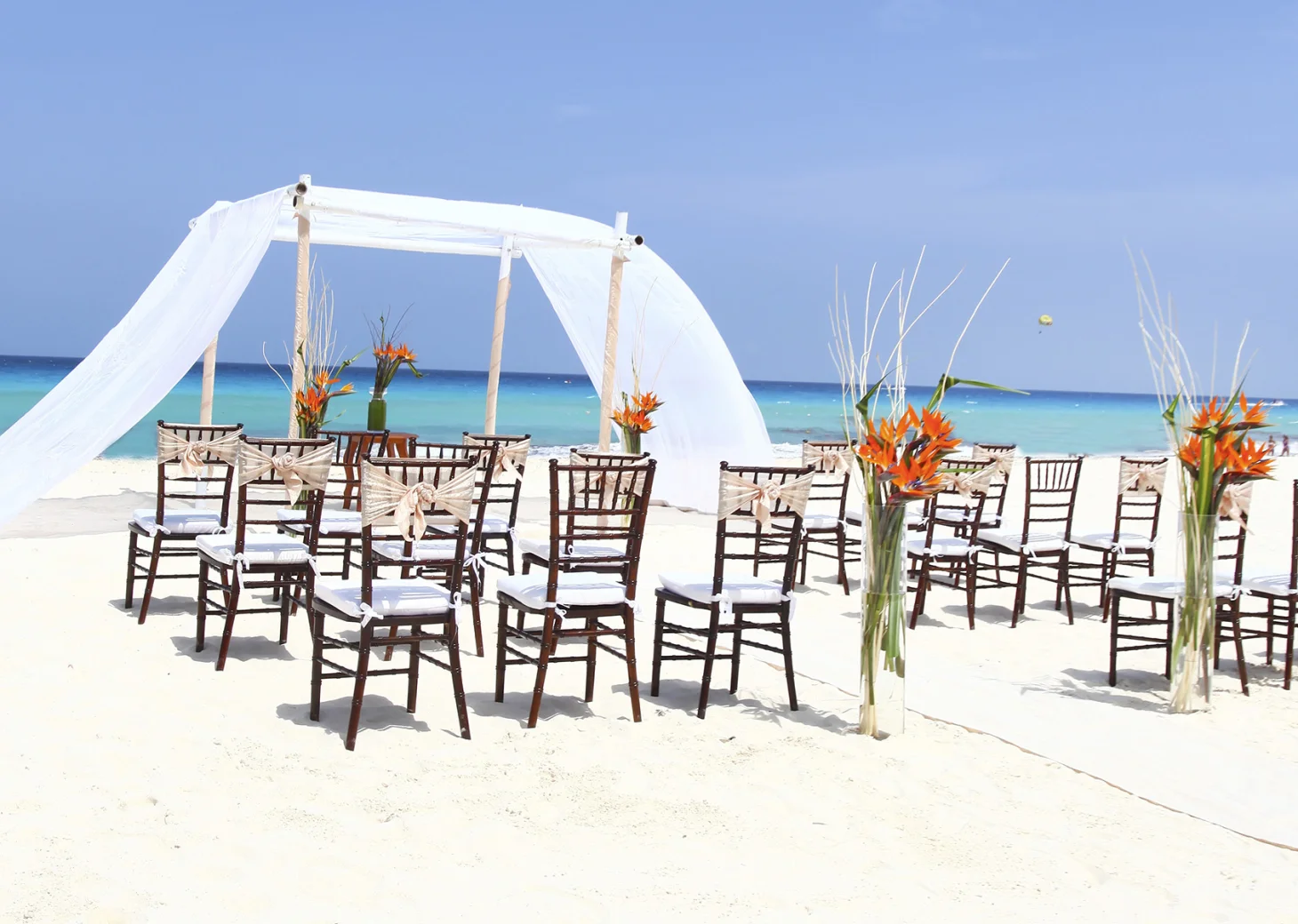 Ceremony decor on the beach wedding venue at Sandos Cancun
