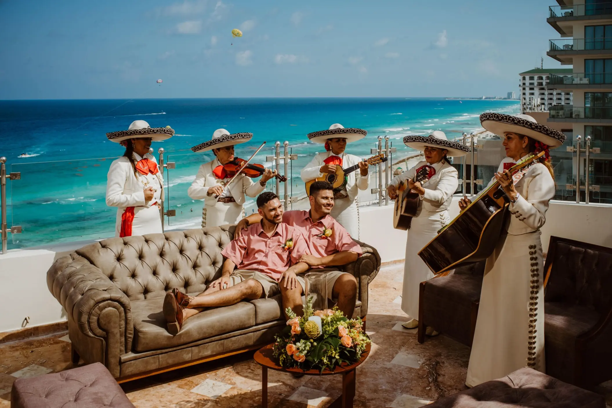 Mariachi band performing for a couple on the penthouse terrace at Sandos Cancun
