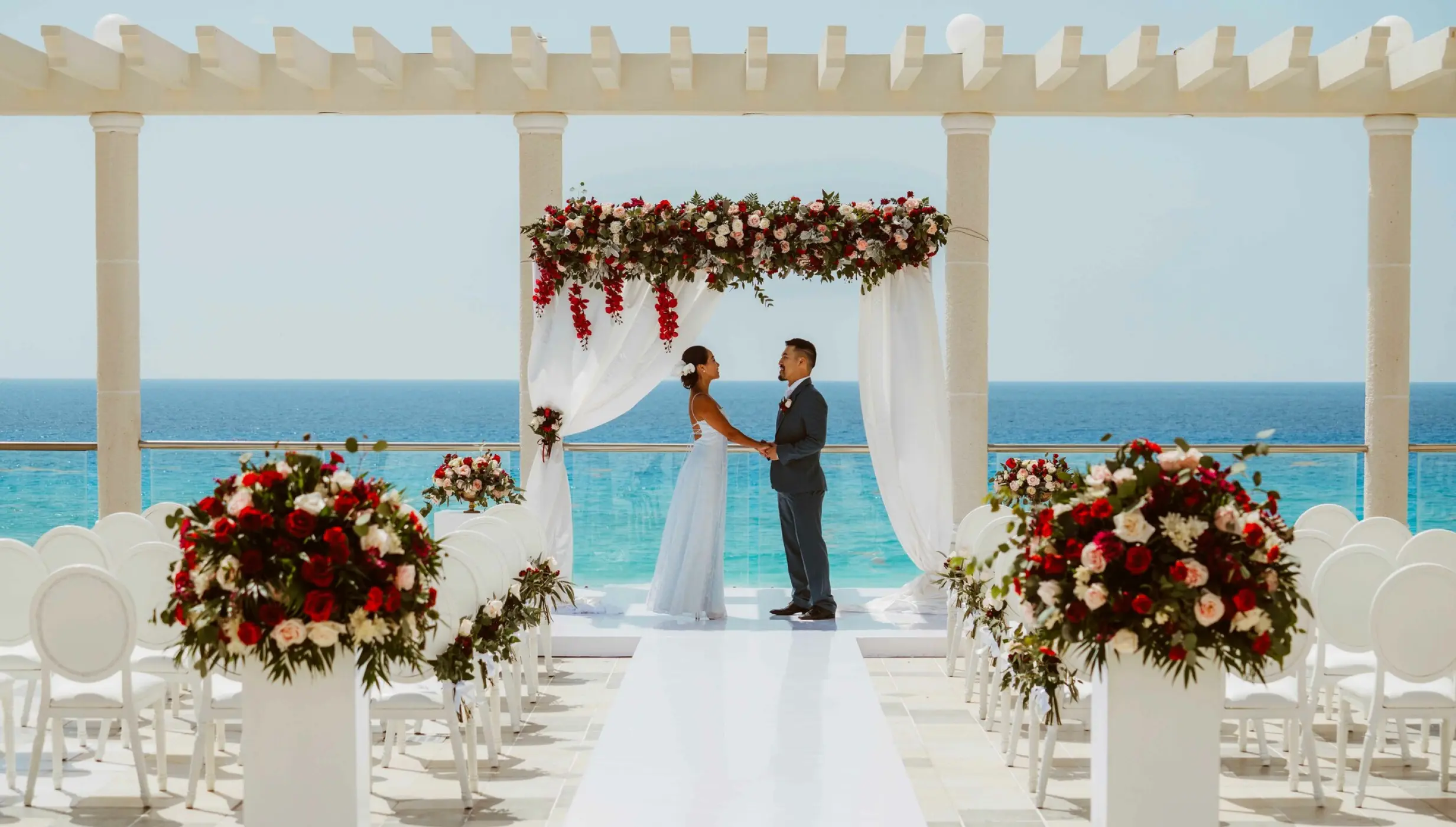 Couple ceremony on the terrace wedding venue at Sandos Cancun