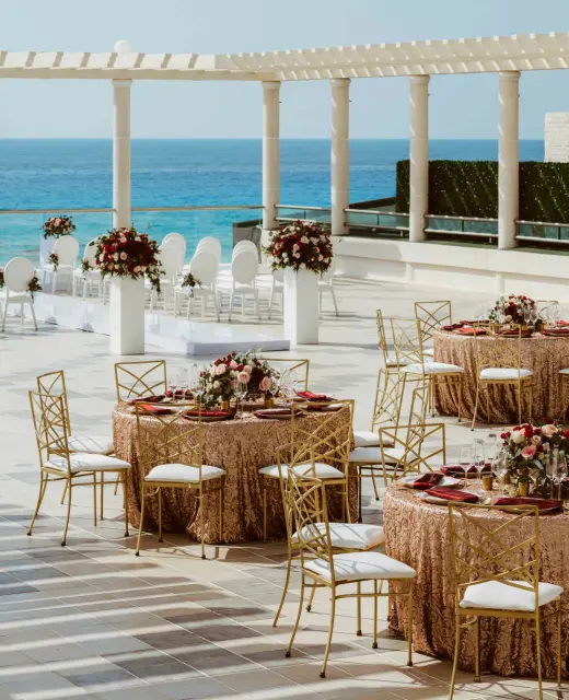 Ceremony and dinner reception decor on the terrace wedding venue at Sandos Cancun