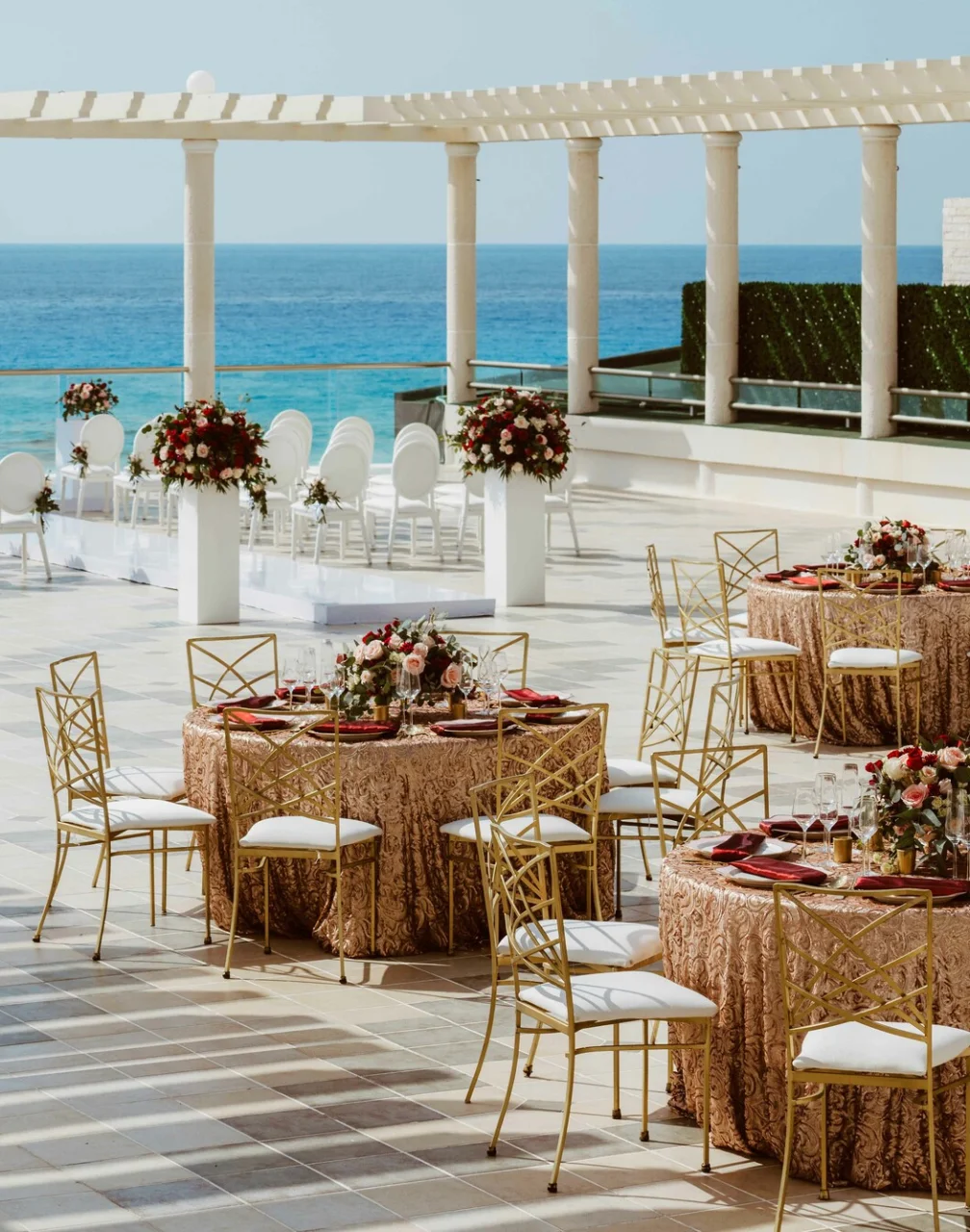 Ceremony and dinner reception decor on the terrace wedding venue at Sandos Cancun