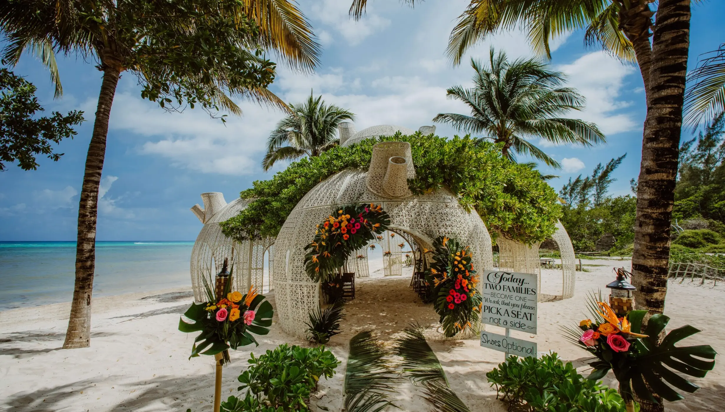 White woven beach gazebo for a wedding ceremony at Sandos Caracol, Playa Del Carmen