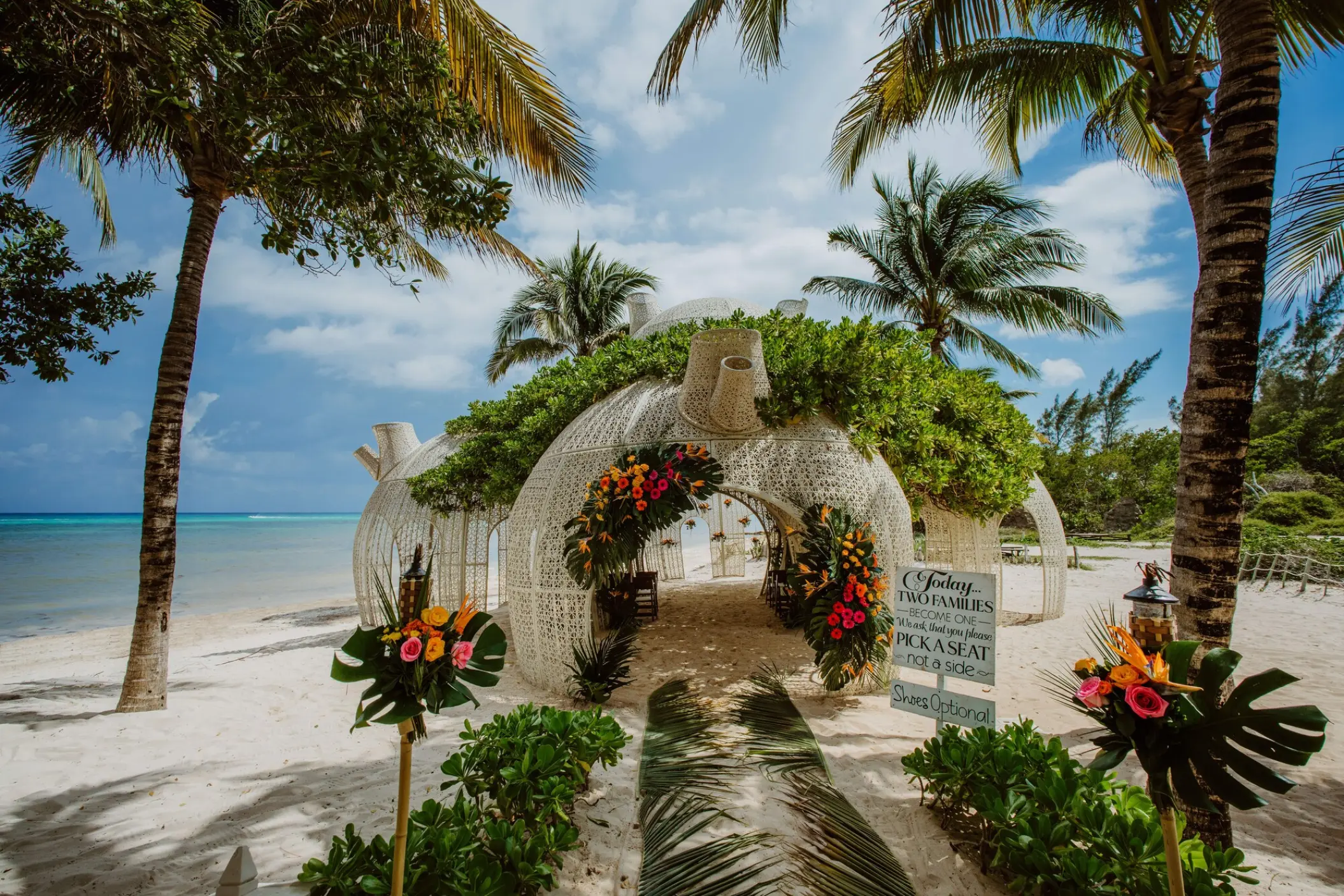 White woven beach gazebo for a wedding ceremony at Sandos Caracol, Playa Del Carmen
