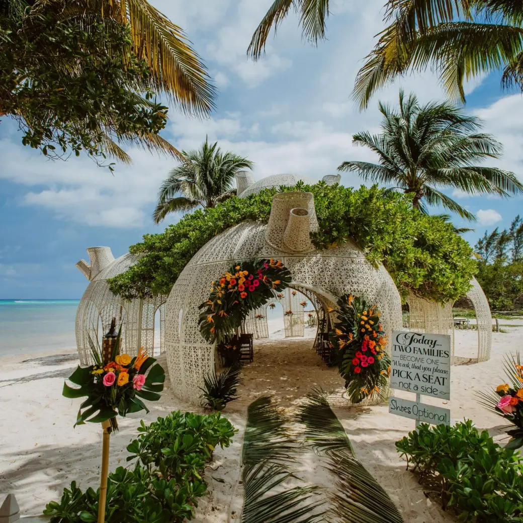 White woven beach gazebo for a wedding ceremony at Sandos Caracol, Playa Del Carmen
