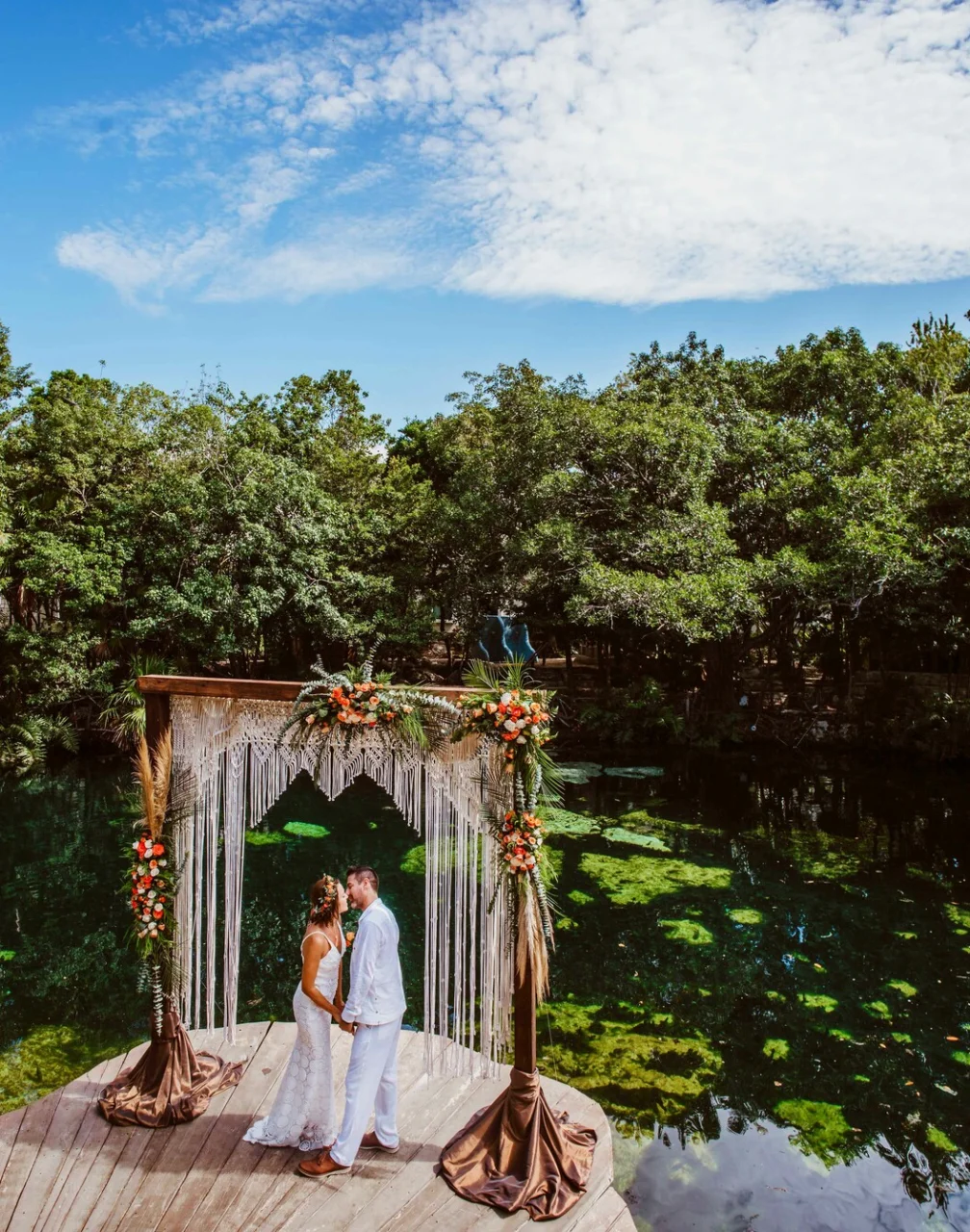 Sandos Caracol Eco Resort cenote wedding venue with couple