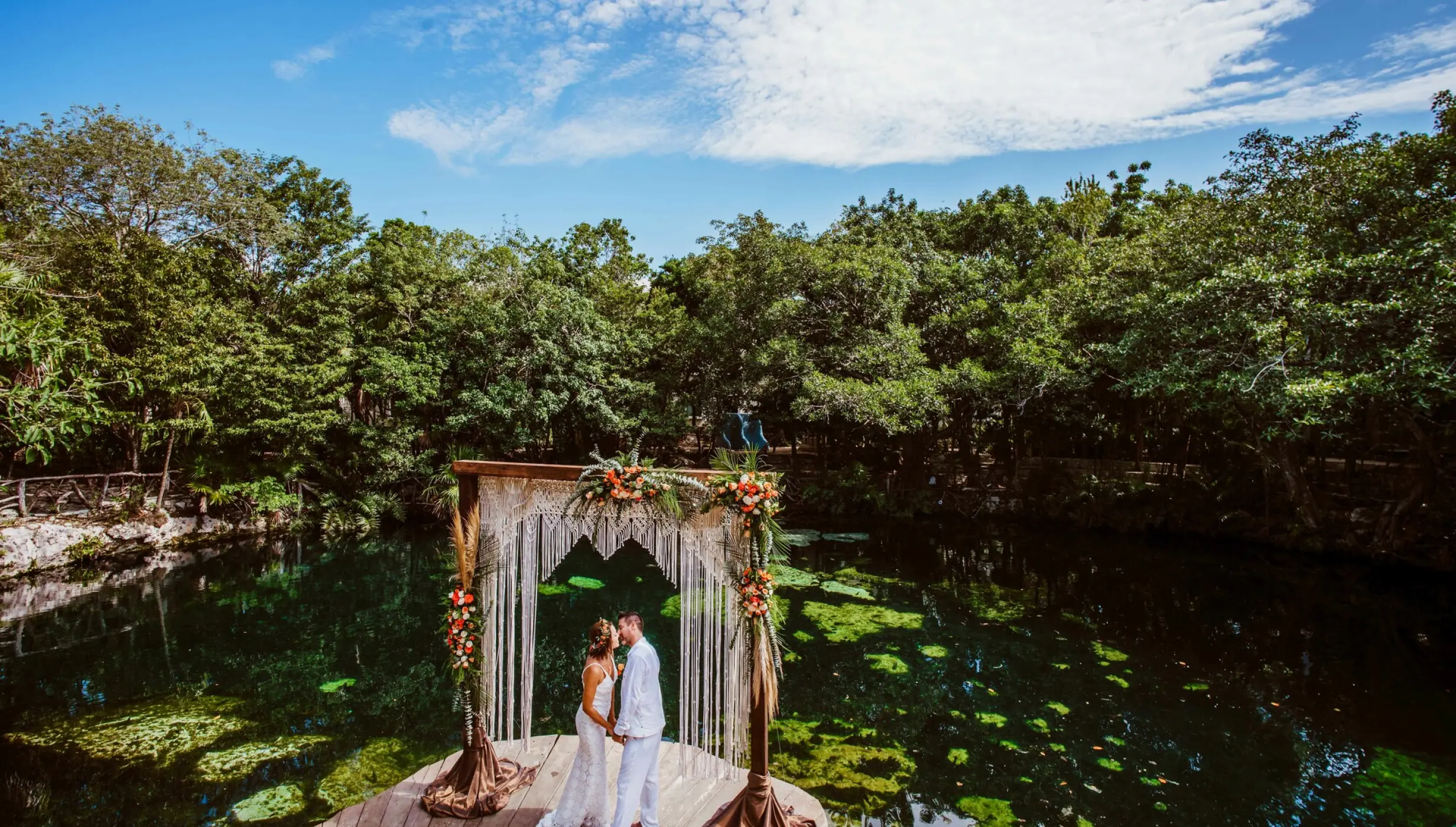 Sandos Caracol Eco Resort cenote wedding venue with couple