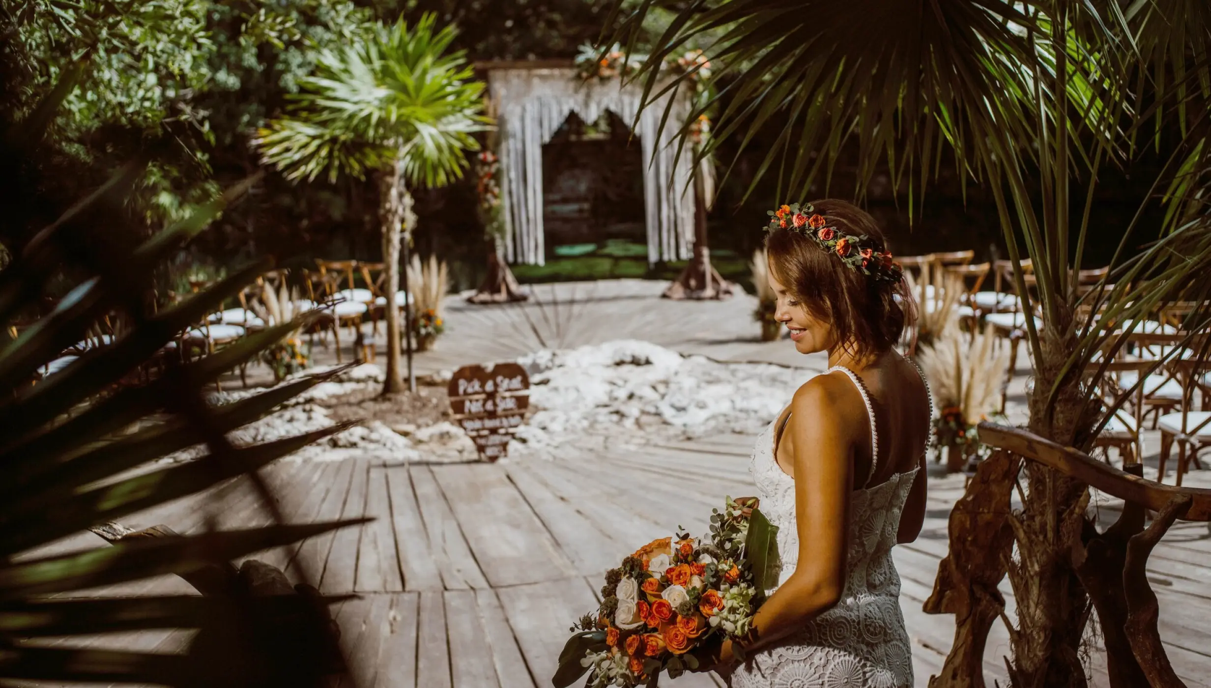 Ceremony decor on the cenote cristalino wedding venue at Sandos Caracol Eco Resort