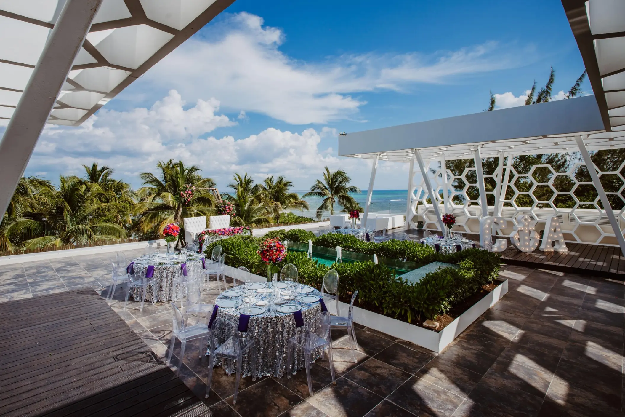 Rooftop terrace wedding reception at Sandos Caracol, Playa Del Carmen