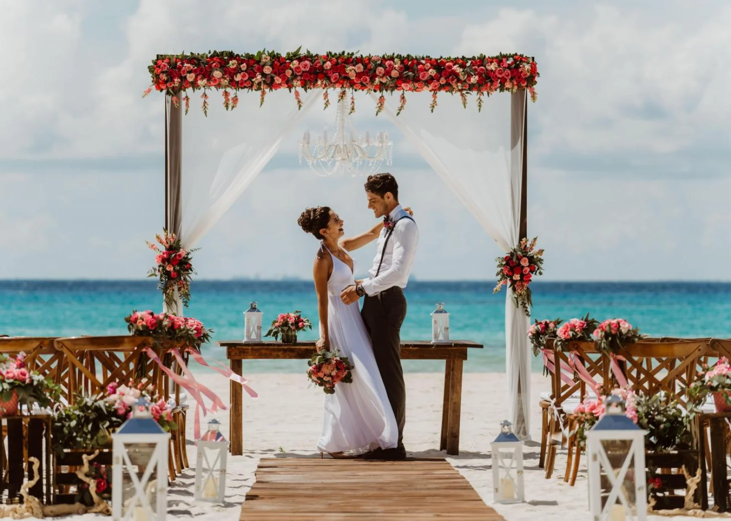 Couple wedding on the beach wedding venue at Sandos Playacar Beach Resort