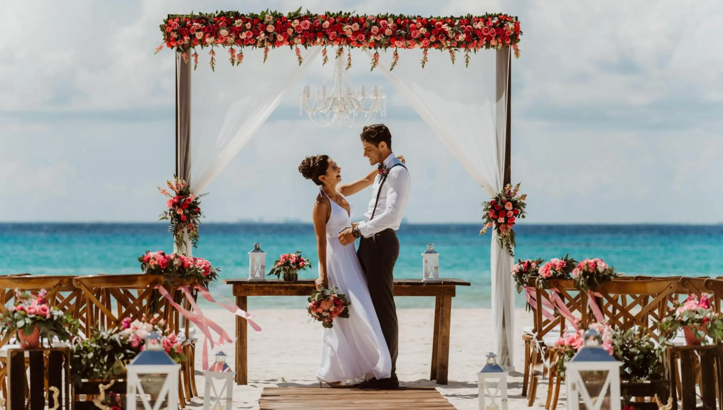 Couple wedding on the beach wedding venue at Sandos Playacar Beach Resort