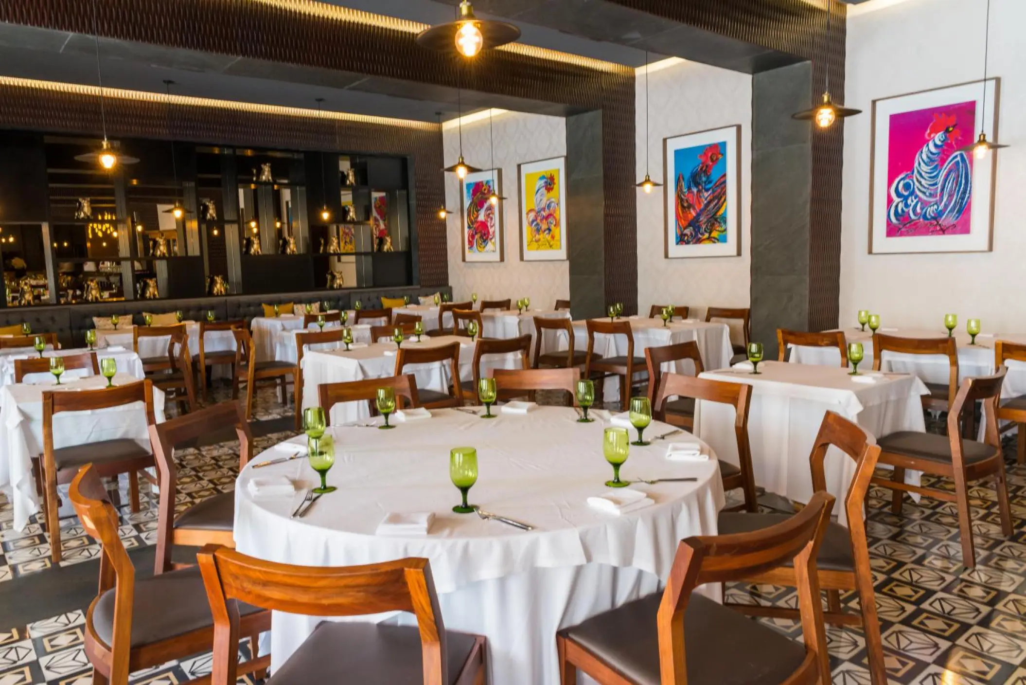 Gourmex restaurant dining area with white tablecloths at Sandos Playacar, Playa Del Carmen