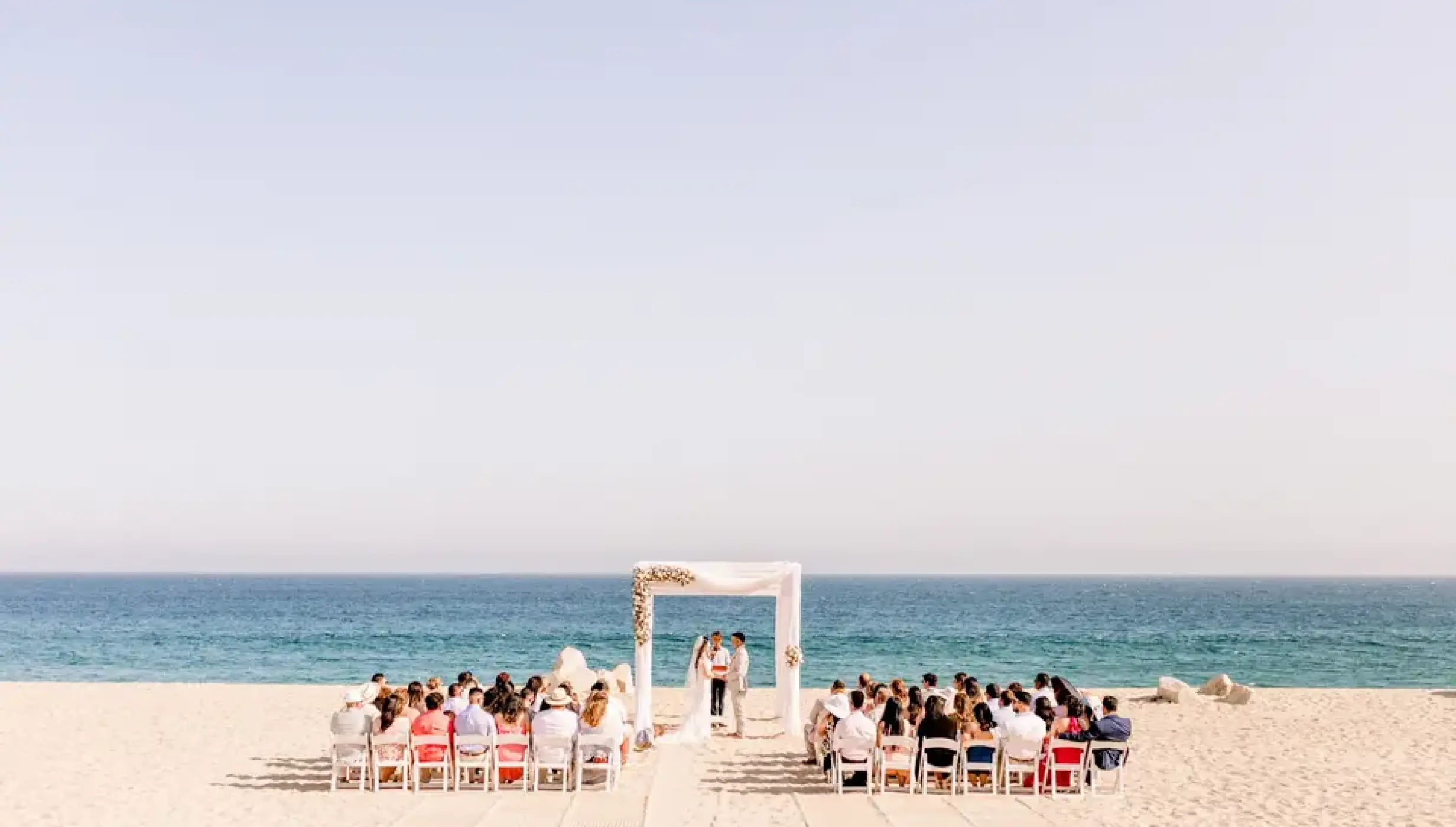 Ceremony decor on the beach at Sandos Finisterra Los Cabos