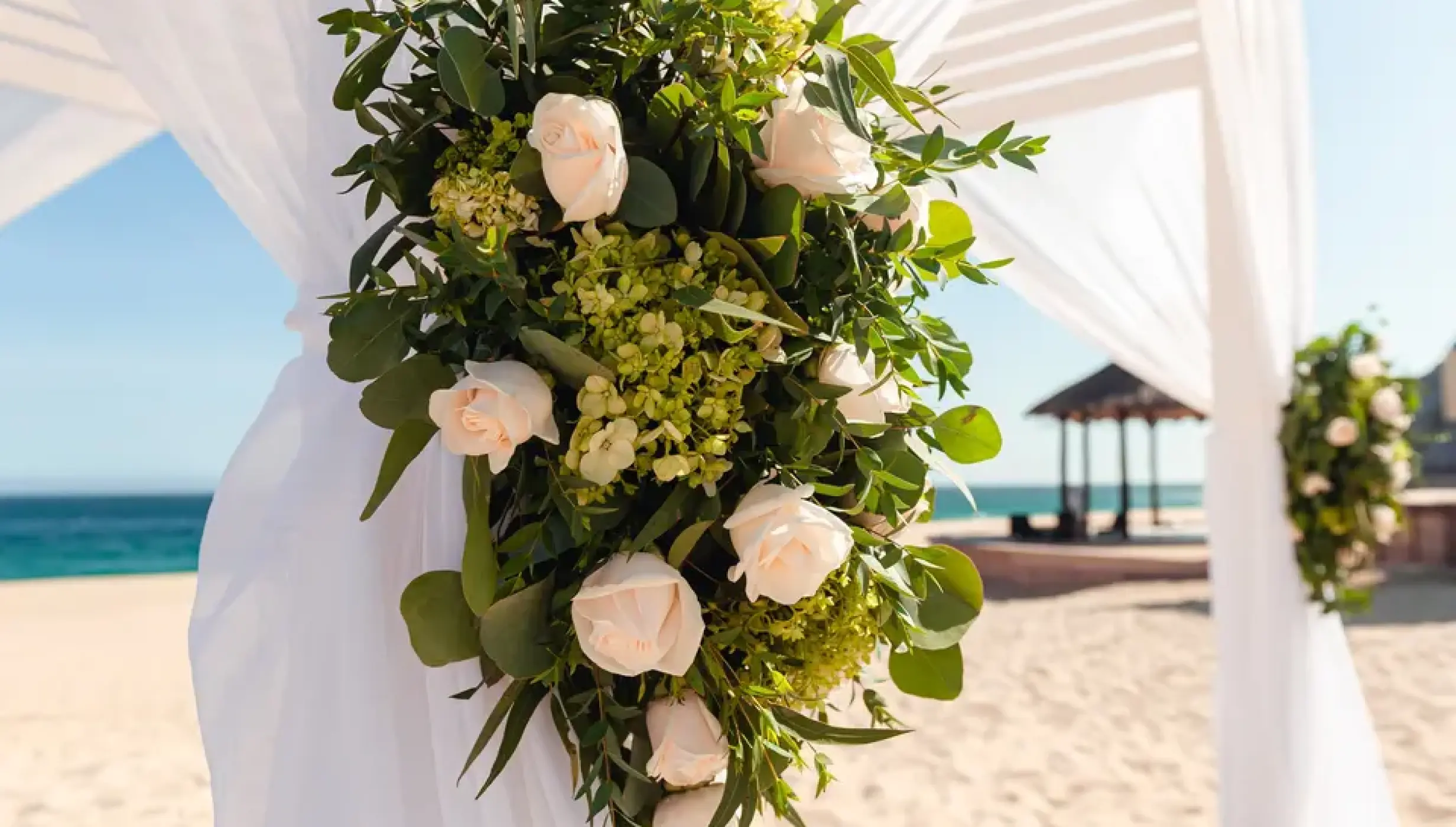 Ceremony decor on the beach at Sandos Finisterra Los Cabos