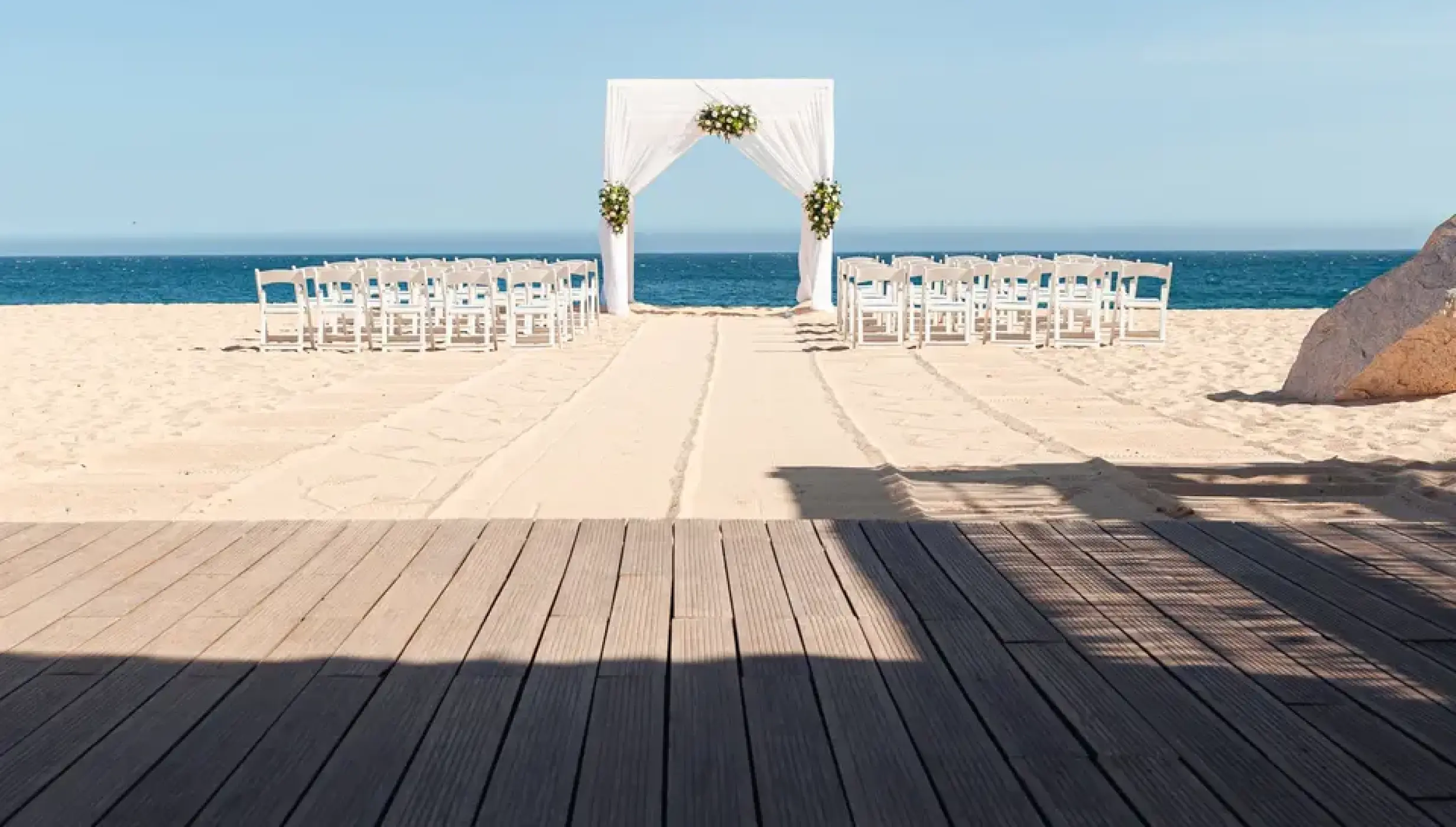 Ceremony decor on the beach at Sandos Finisterra Los Cabos