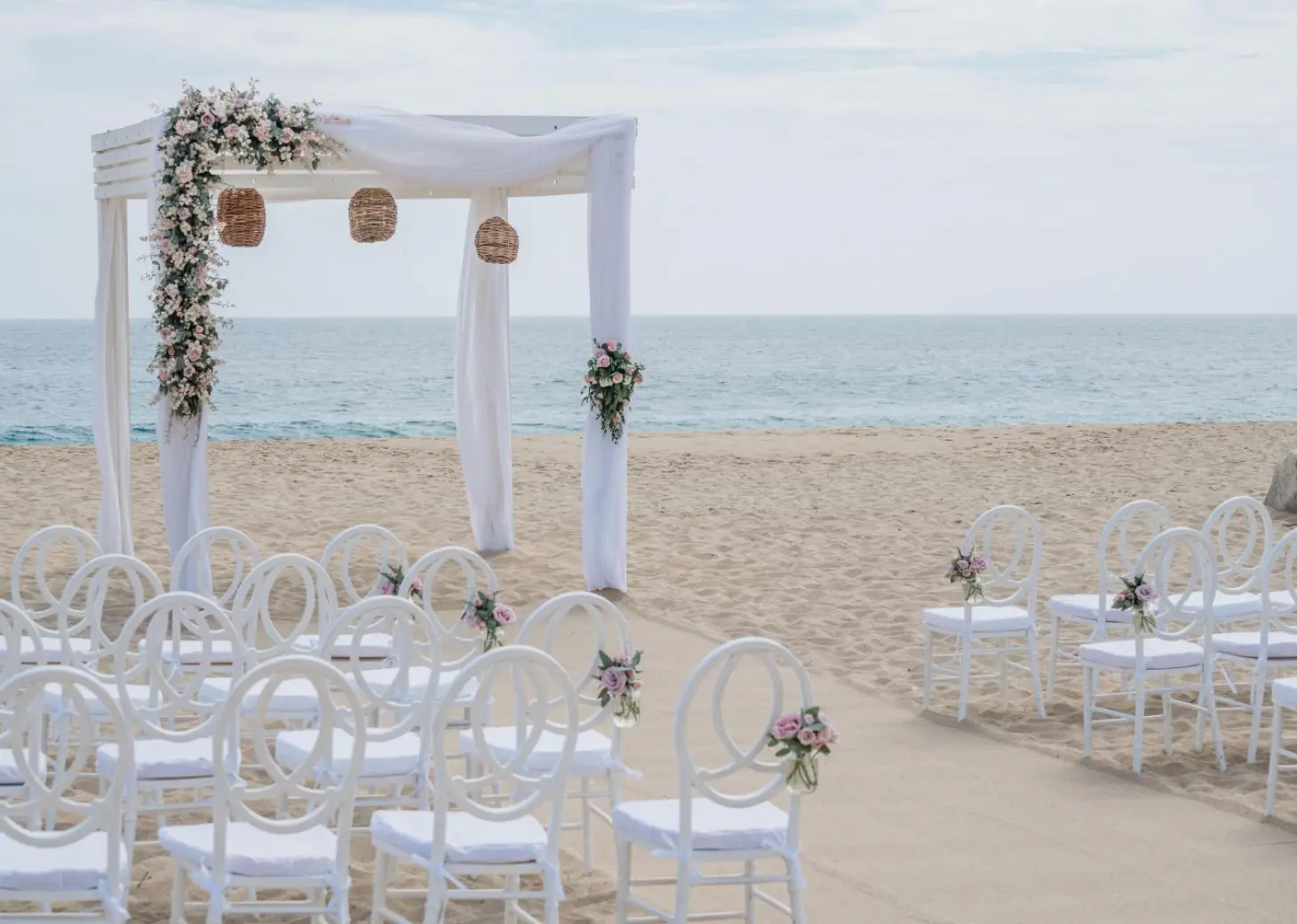 Ceremony decor on the beach at Sandos Finisterra Los Cabos