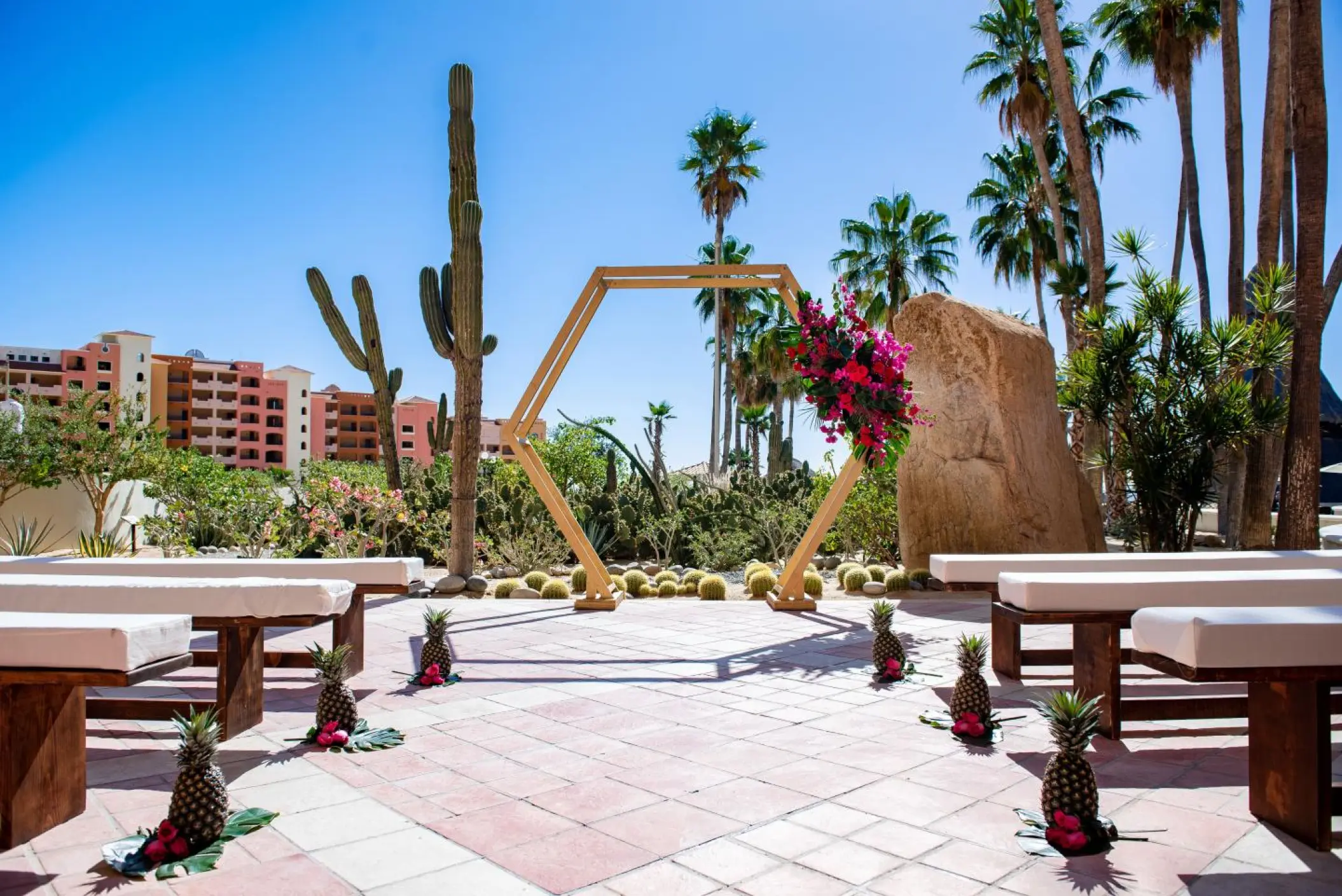 Hexagonal wooden arch ceremony at Sandos Finisterra, Cabo San Lucas