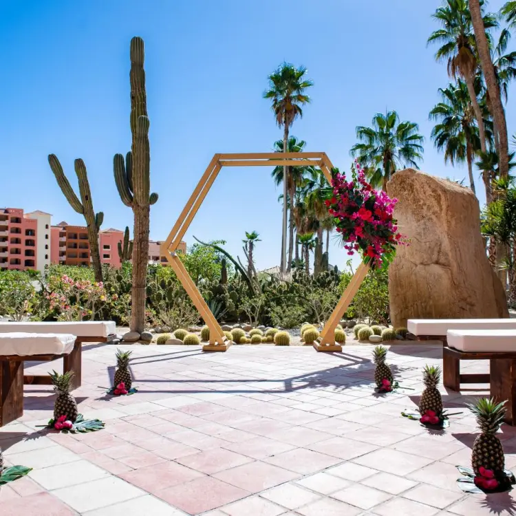 Hexagonal wooden arch ceremony at Sandos Finisterra, Cabo San Lucas