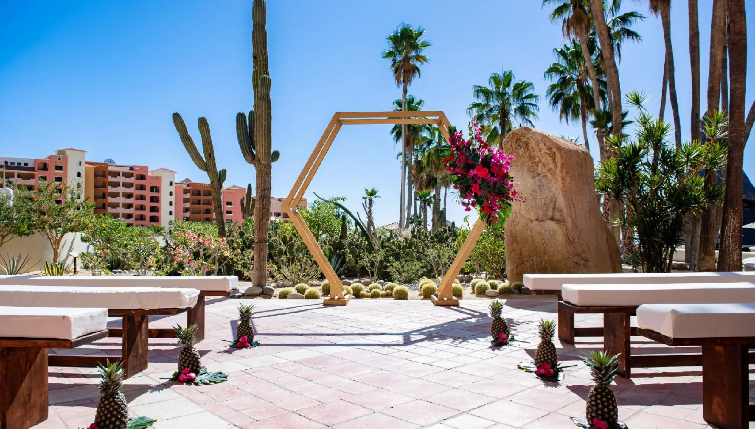 Hexagonal wooden arch ceremony at Sandos Finisterra, Cabo San Lucas