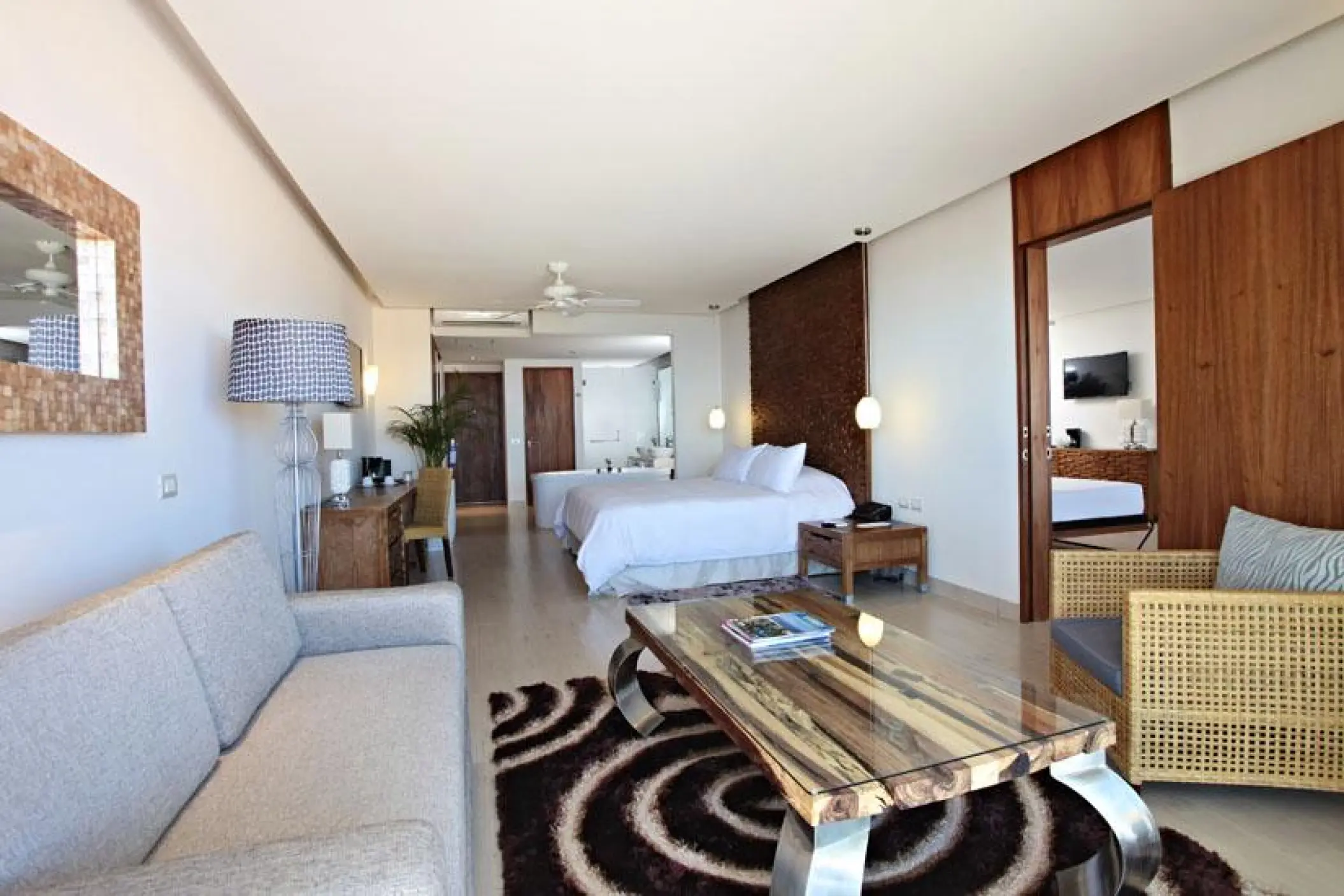 Master suite living area and bedroom at Sandos Finisterra, Cabo San Lucas