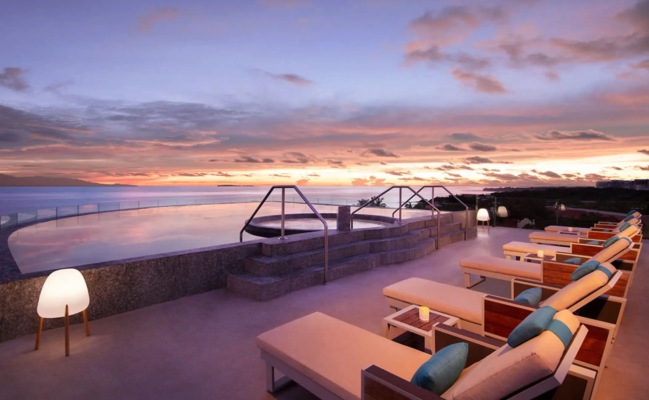 Marietas rooftop infinity pool and lounge chairs at sunset, Secrets Bahia Mita, Puerto Vallarta