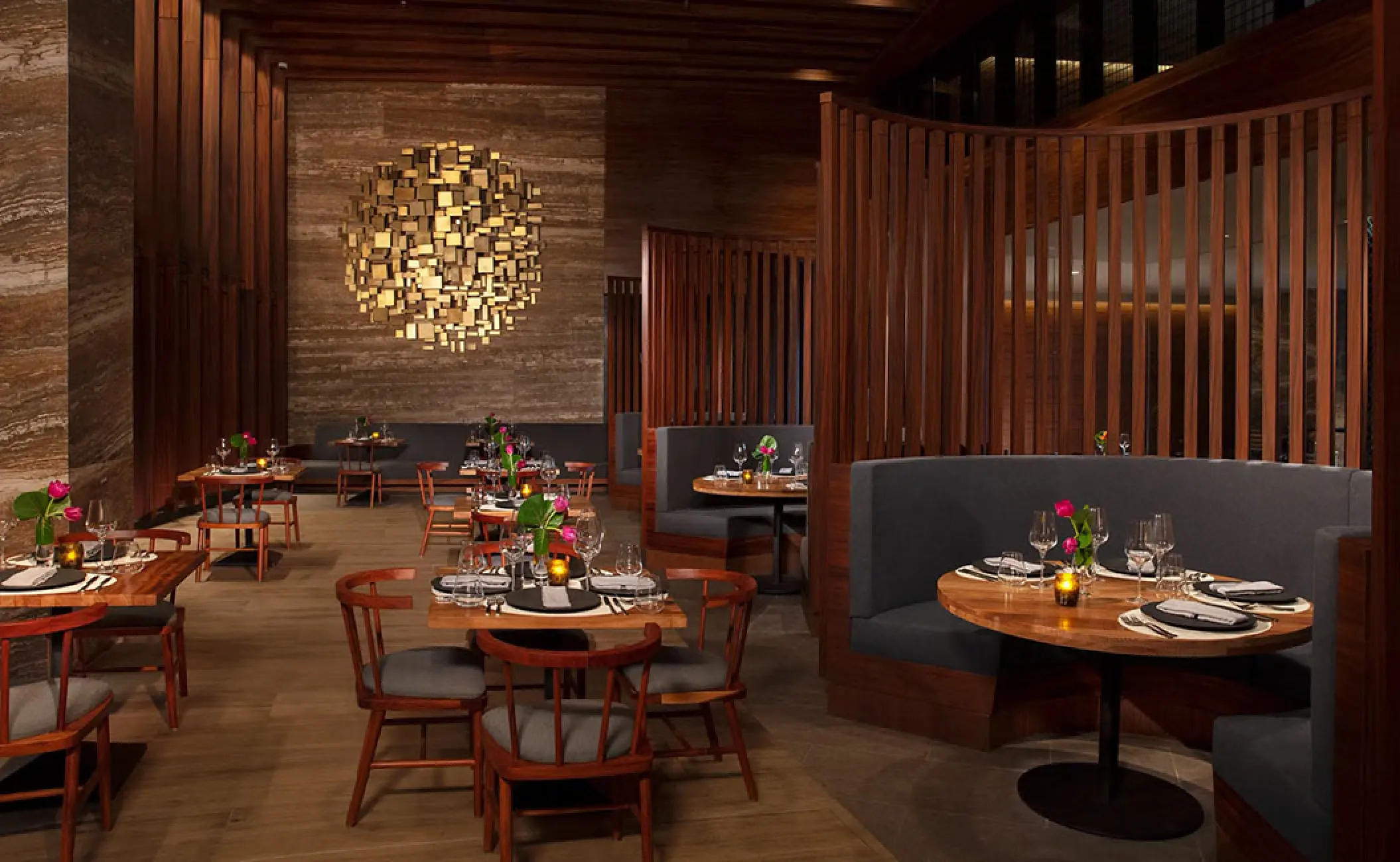 Bordeaux restaurant dining area with modern gold light fixture at Secrets Bahia Mita, Puerto Vallarta