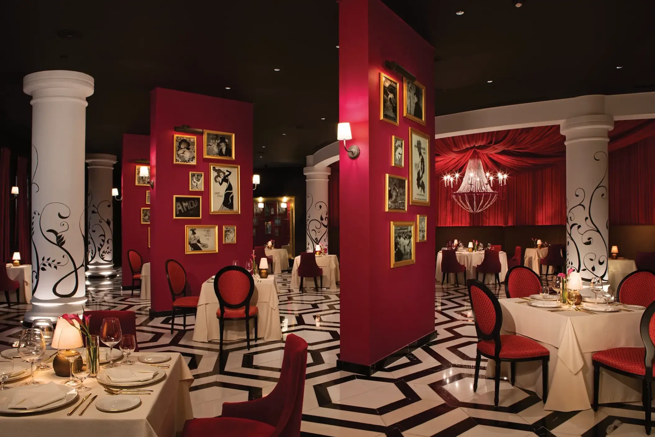 Bordeaux restaurant with red pillars and patterned floors at Secrets Akumal, Riviera Maya