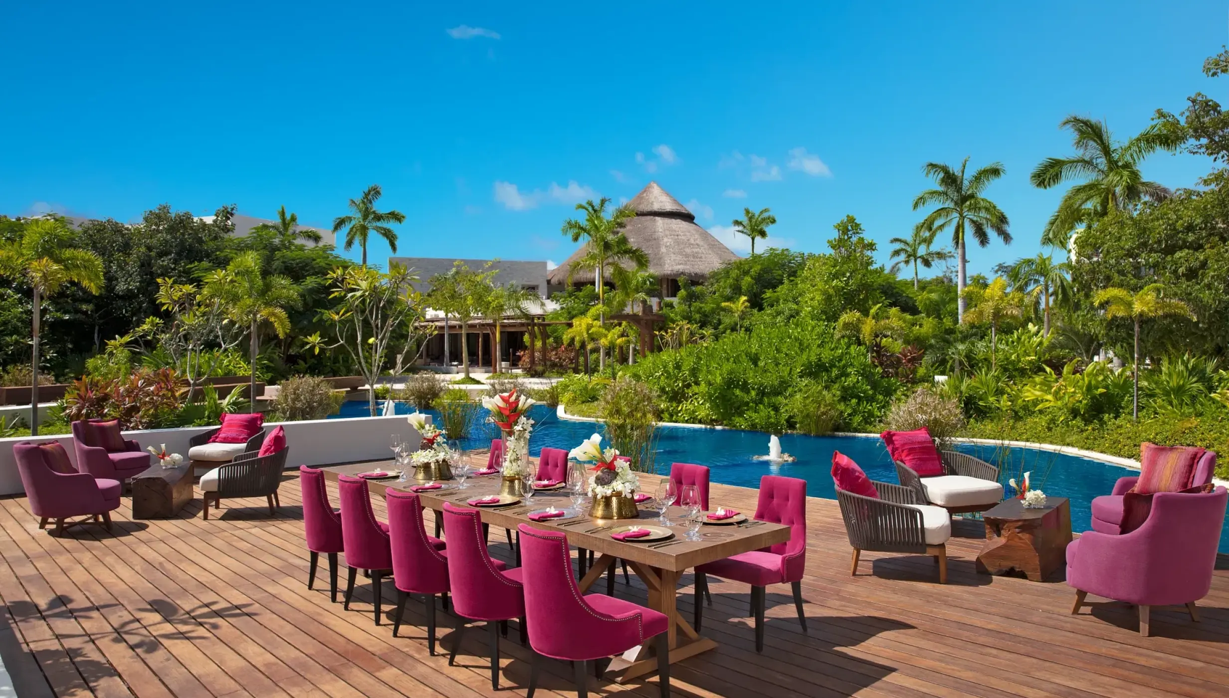 Dinner reception decor on coco cafe deck wedding venue at Secrets Akumal Riviera Maya