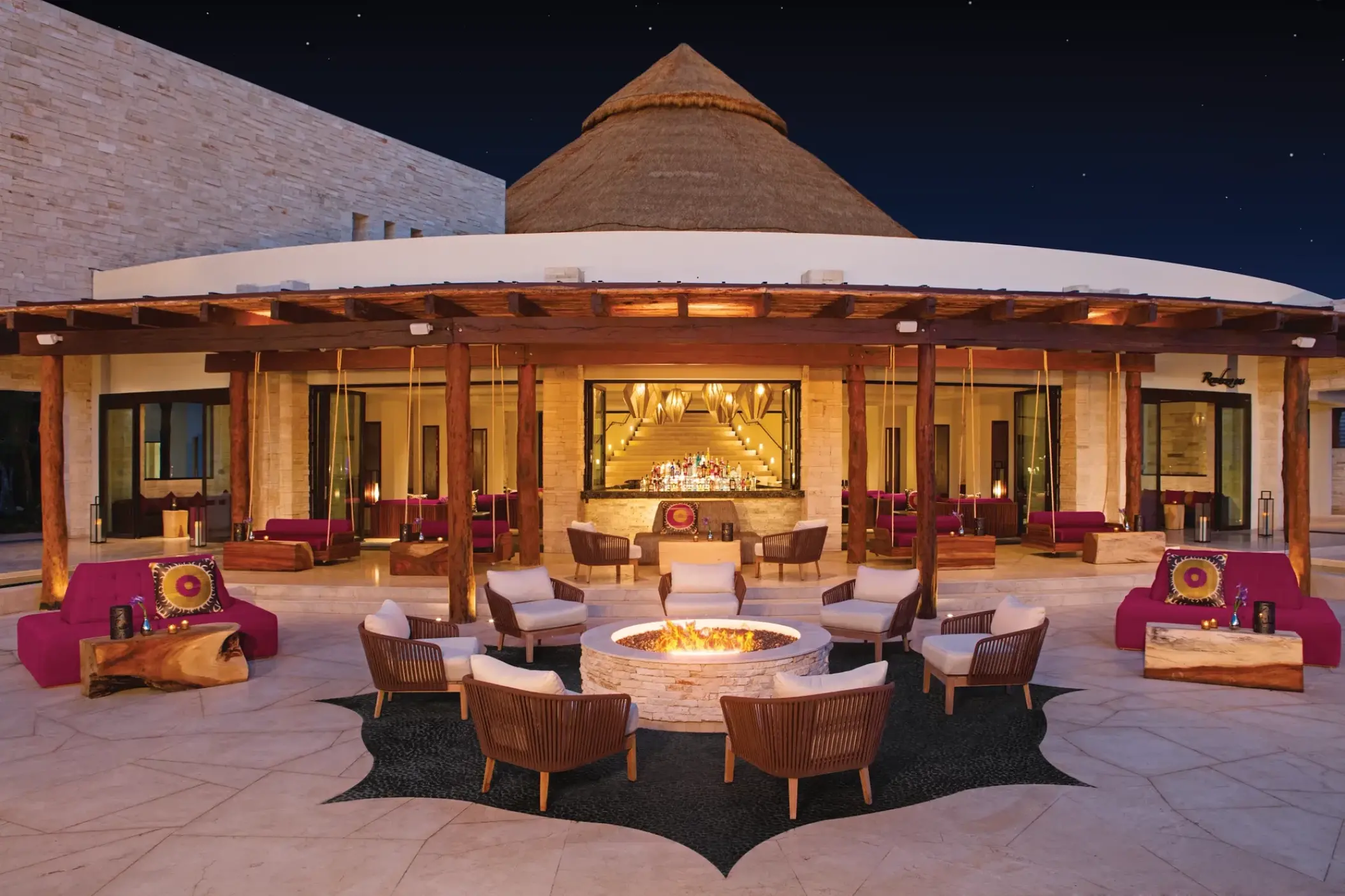 Rendezvous Terrace with fire pit at night, Secrets Akumal, Riviera Maya