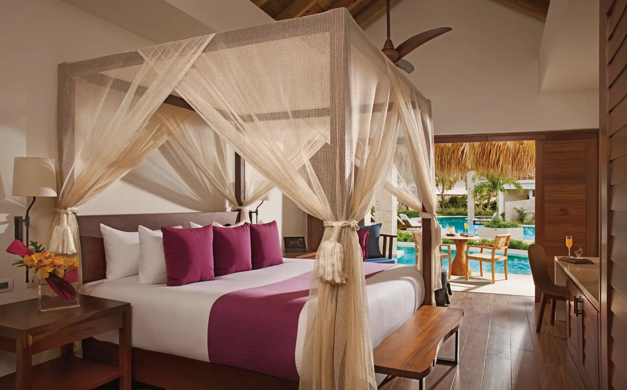 Bungalow suite with canopy bed and swim-out pool access at Secrets Cap Cana, Punta Cana