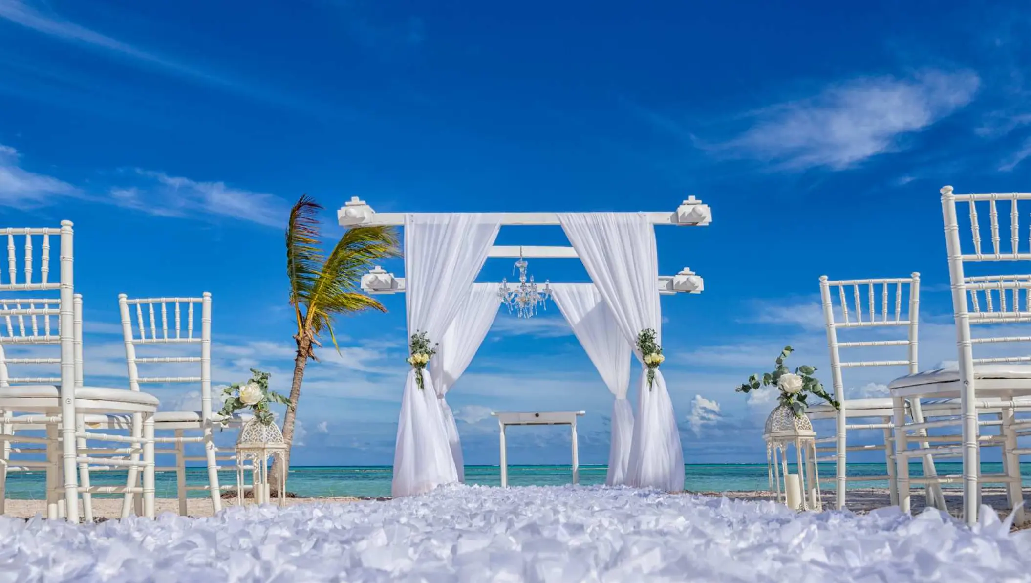 Beachfront wedding ceremony setup at Secrets Cap Cana, Punta Cana