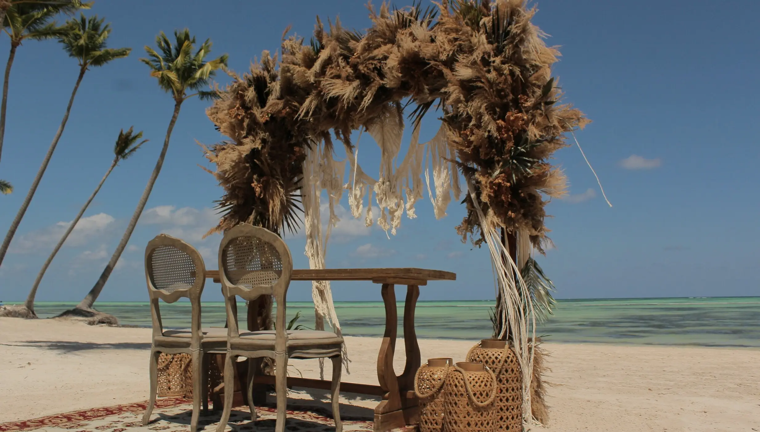 Ceremony decor in the beach at Secrets Cap Cana Resort and Spa