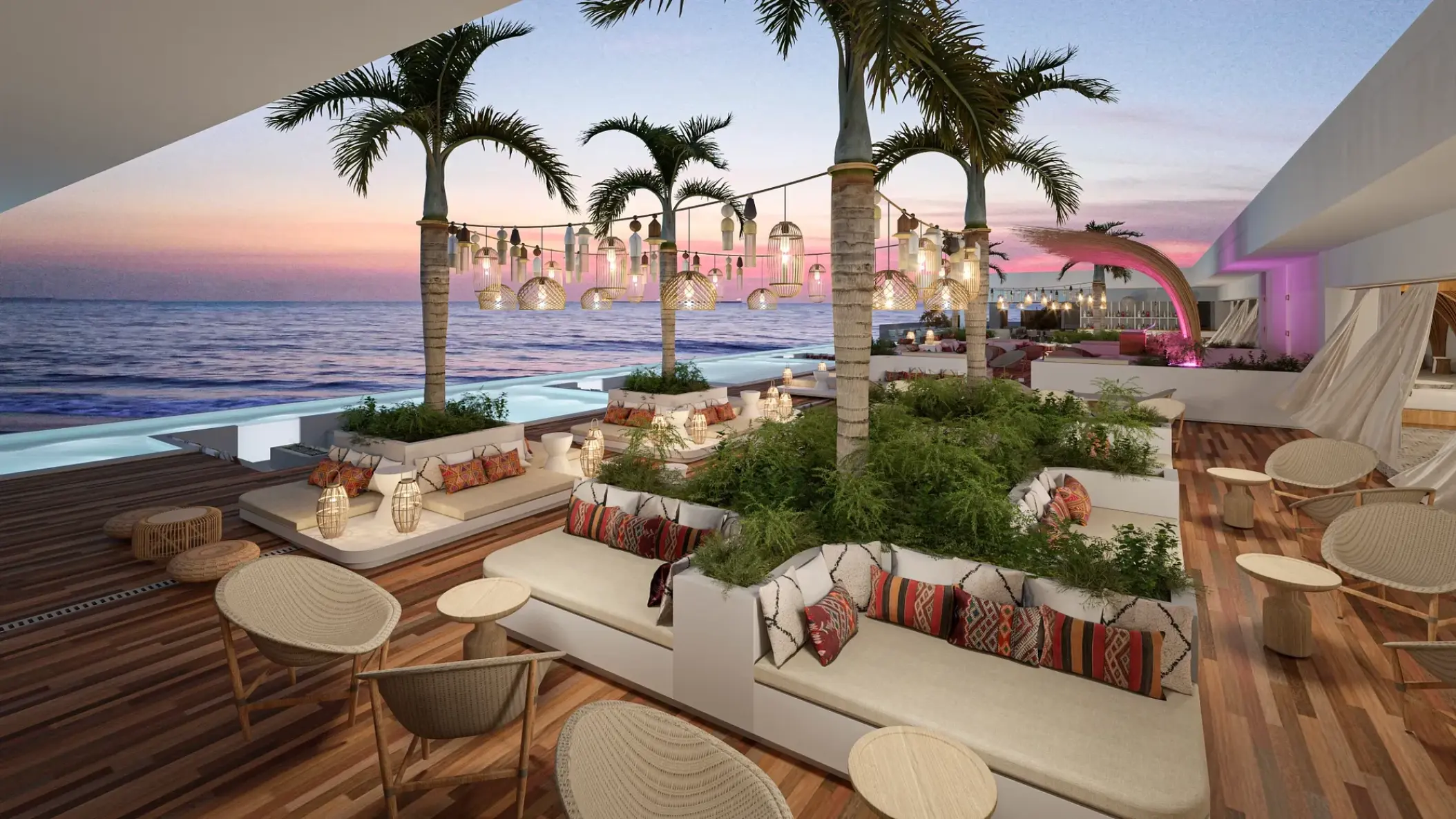 Rooftop lounge with palm trees and ocean views at Impression Isla Mujeres by Secrets