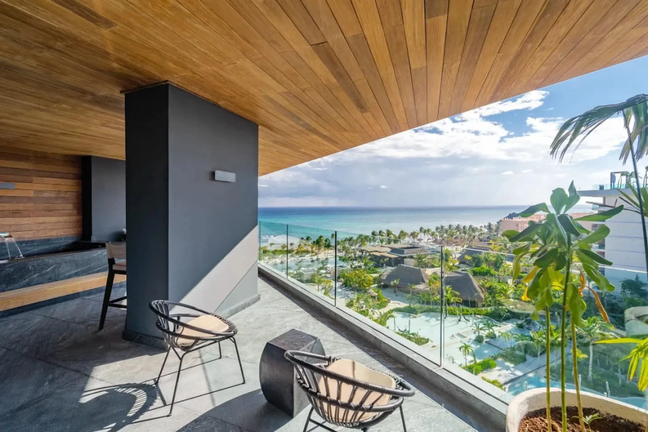 Terrace with ocean views and modern seating at Secrets Moxche, Playa Del Carmen