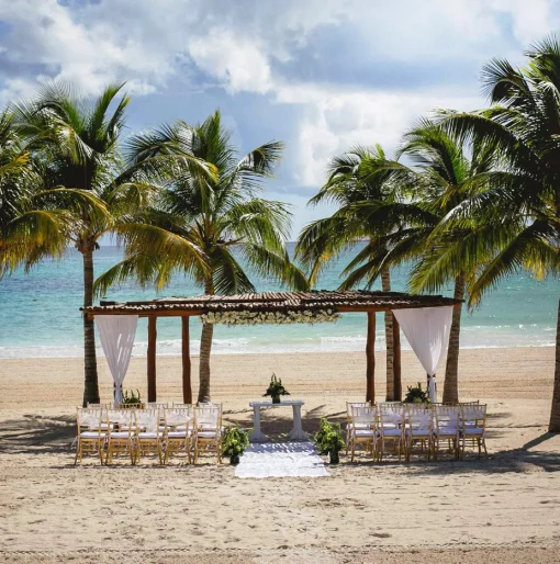 Ceremony decor on the beach wedding venue at Secrets Maroma Beach Riviera Maya
