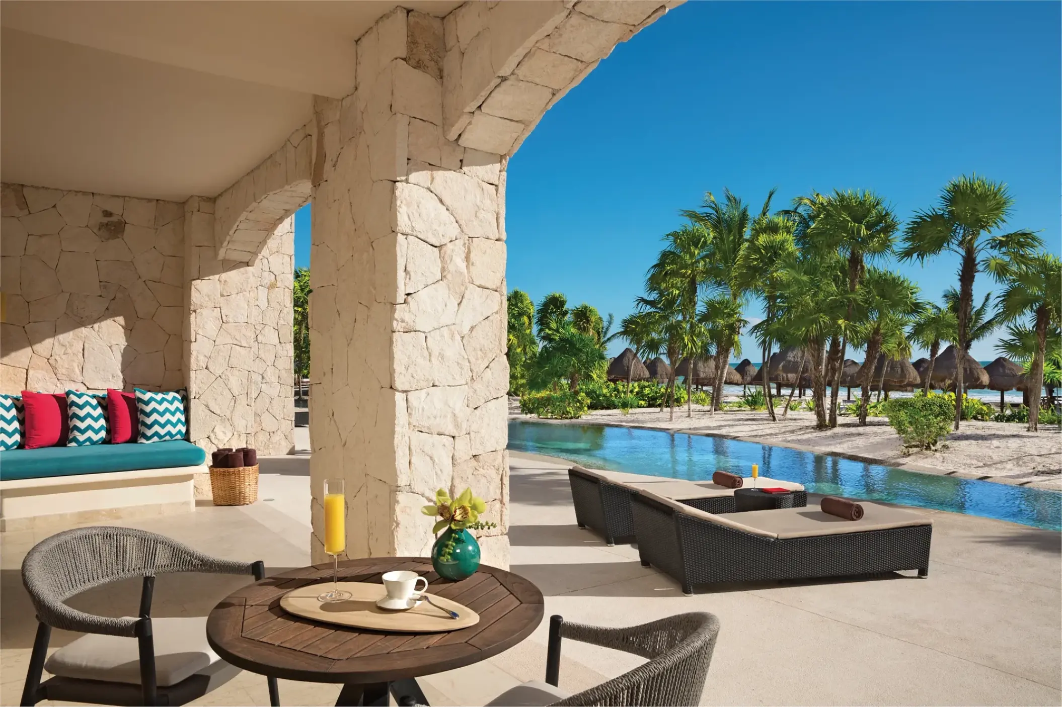Presidential suite terrace with private pool and stone arches at Secrets Maroma Beach, Riviera Maya