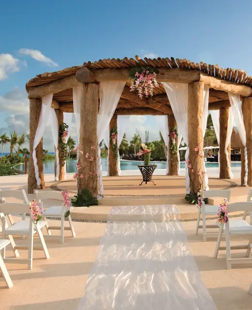 Ceremony decor on pool gazebo at Secrets Maroma Beach Riviera Maya