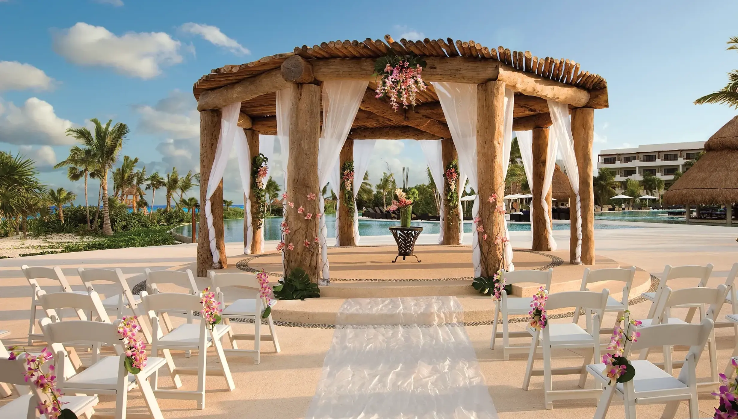 Ceremony decor on pool gazebo at Secrets Maroma Beach Riviera Maya
