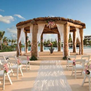 Ceremony decor on pool gazebo at Secrets Maroma Beach Riviera Maya
