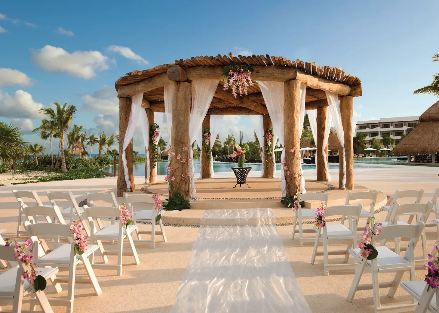 Ceremony decor on pool gazebo at Secrets Maroma Beach Riviera Maya