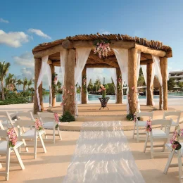 Ceremony decor on pool gazebo at Secrets Maroma Beach Riviera Maya