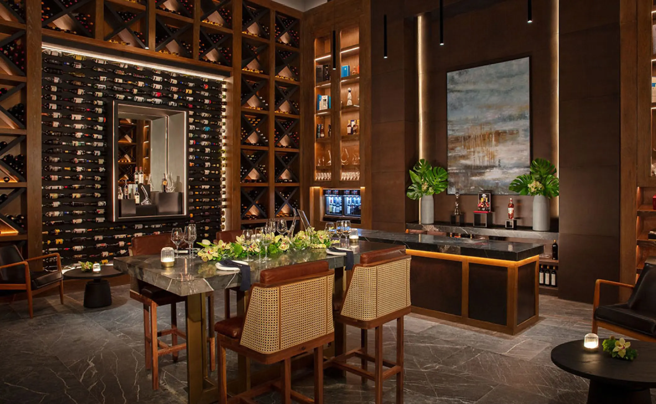 Wine boutique with tasting table and floor-to-ceiling wine racks at Secrets Moxche, Playa Del Carmen