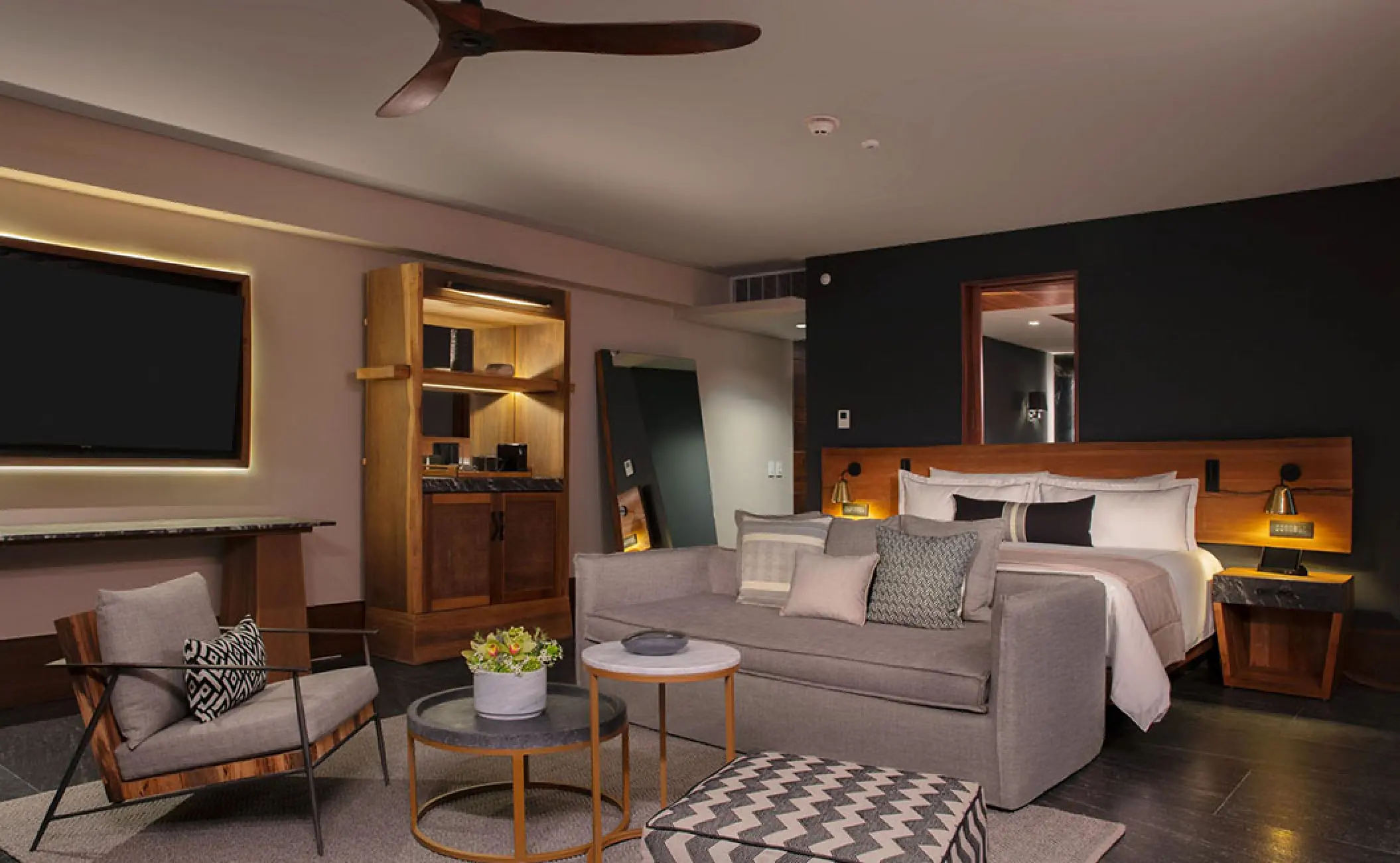 Junior Suite Ocean View with modern seating area and king bed at Secrets Moxche, Playa Del Carmen