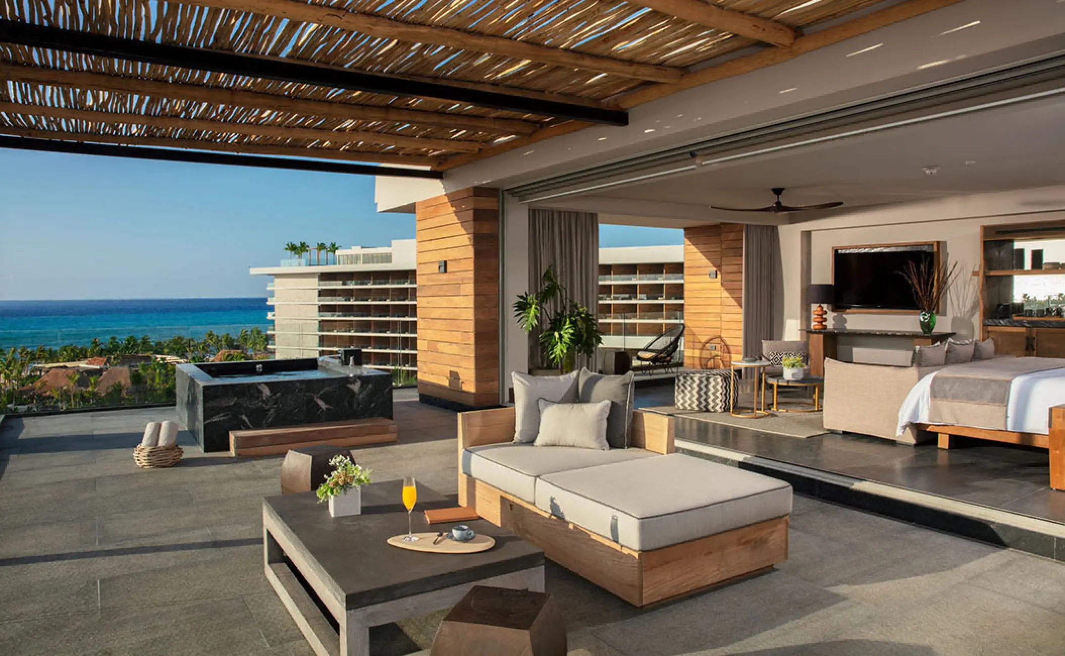 Presidential suite terrace with lounge seating and ocean views at Secrets Moxche, Playa Del Carmen