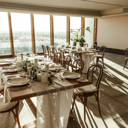Indoor wedding reception with floor-to-ceiling windows at Secrets Moxche, Playa Del Carmen