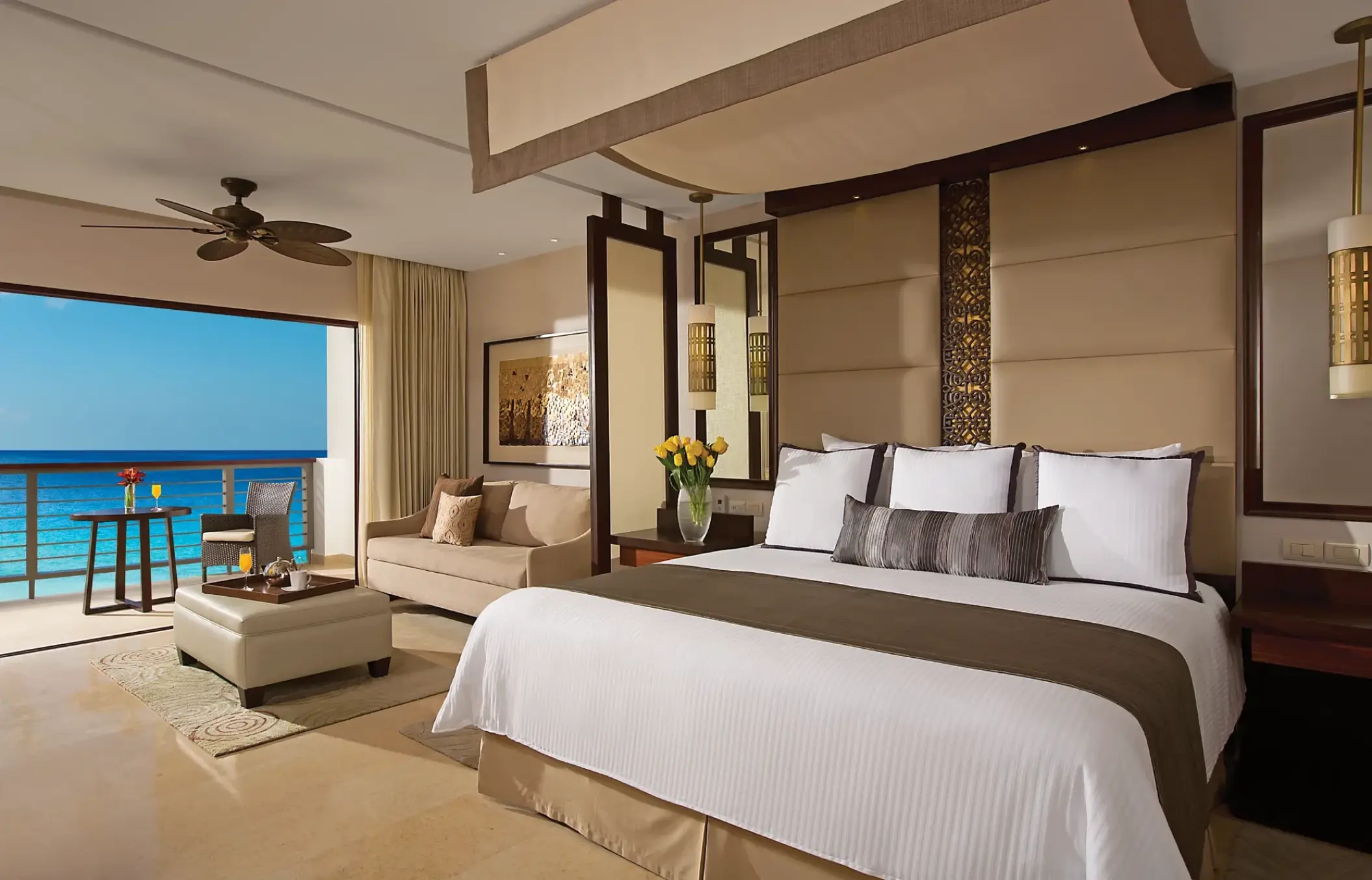 Modern guest suite with ocean views and private balcony at Secrets Playa Mujeres, Cancun