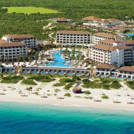 Aerial view of Secrets Playa Mujeres grounds, pools, and beach in Cancun