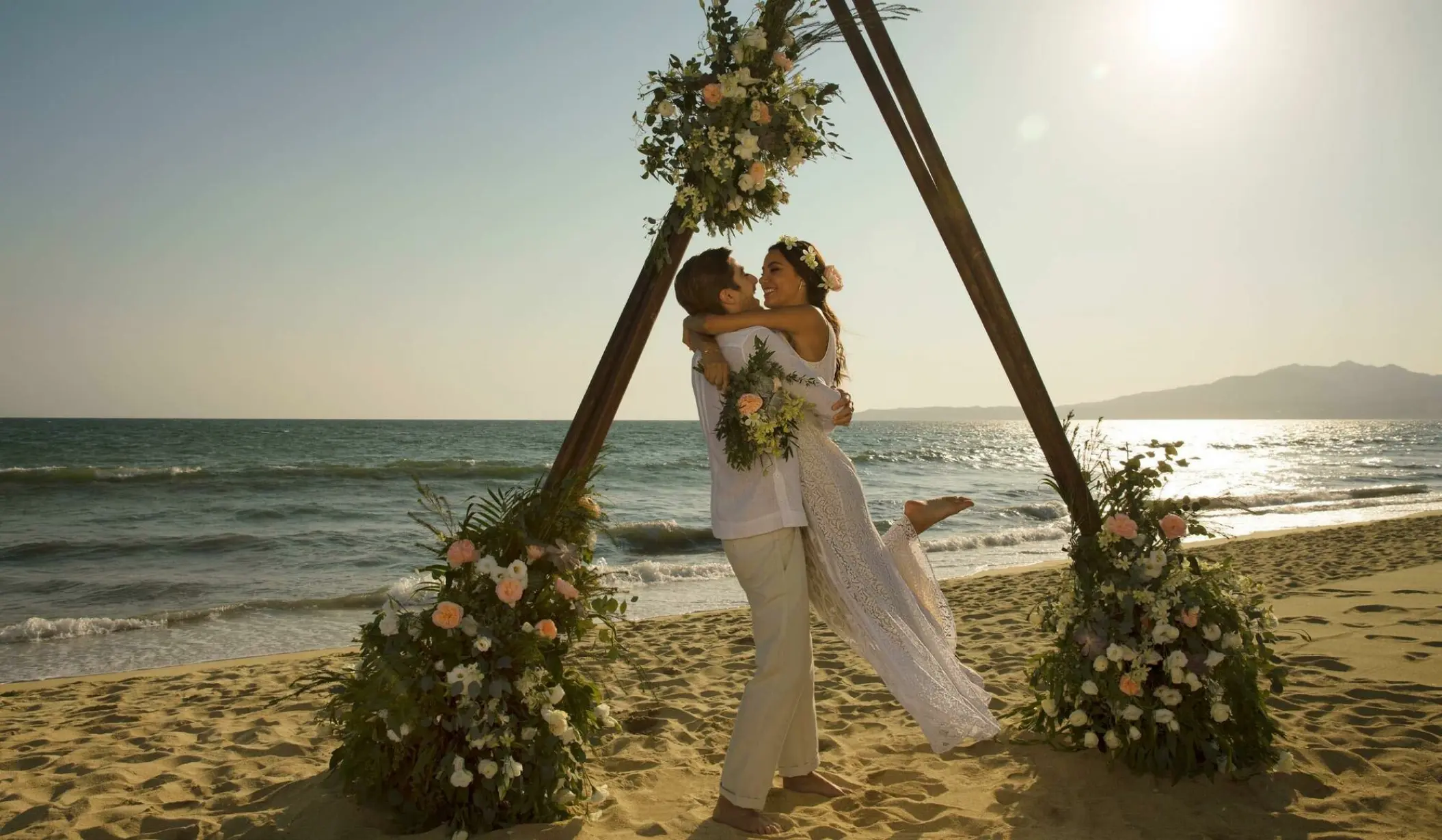 Couple on the beach wedding venue at Secrets Playa Mujeres Golf and Spa