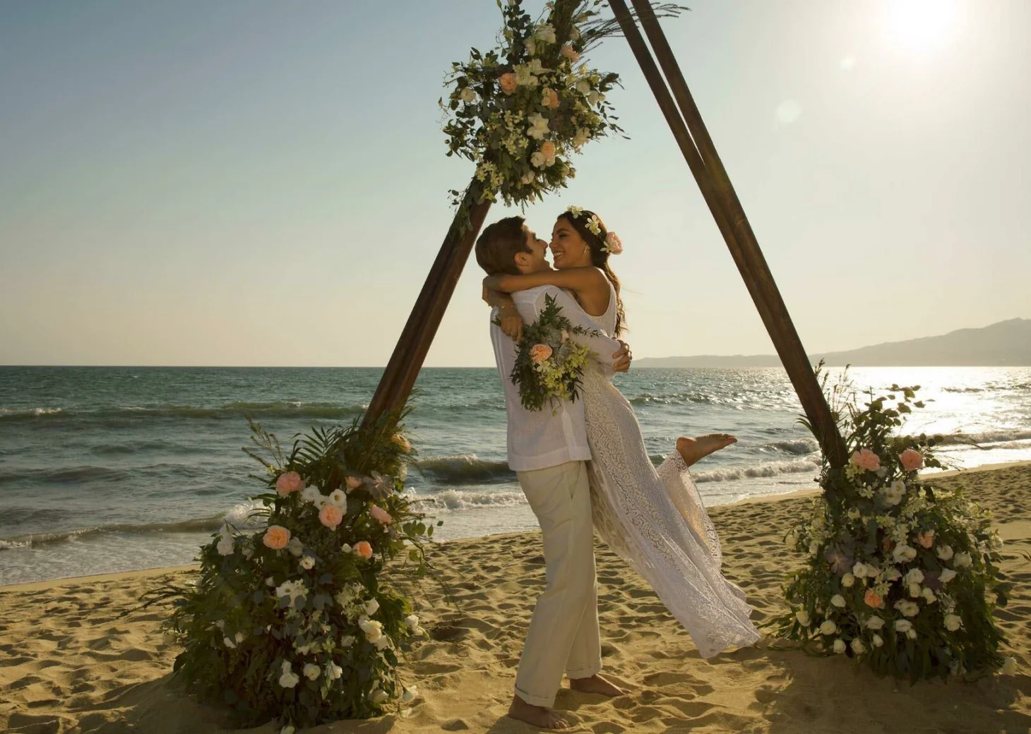 Couple on the beach wedding venue at Secrets Playa Mujeres Golf and Spa