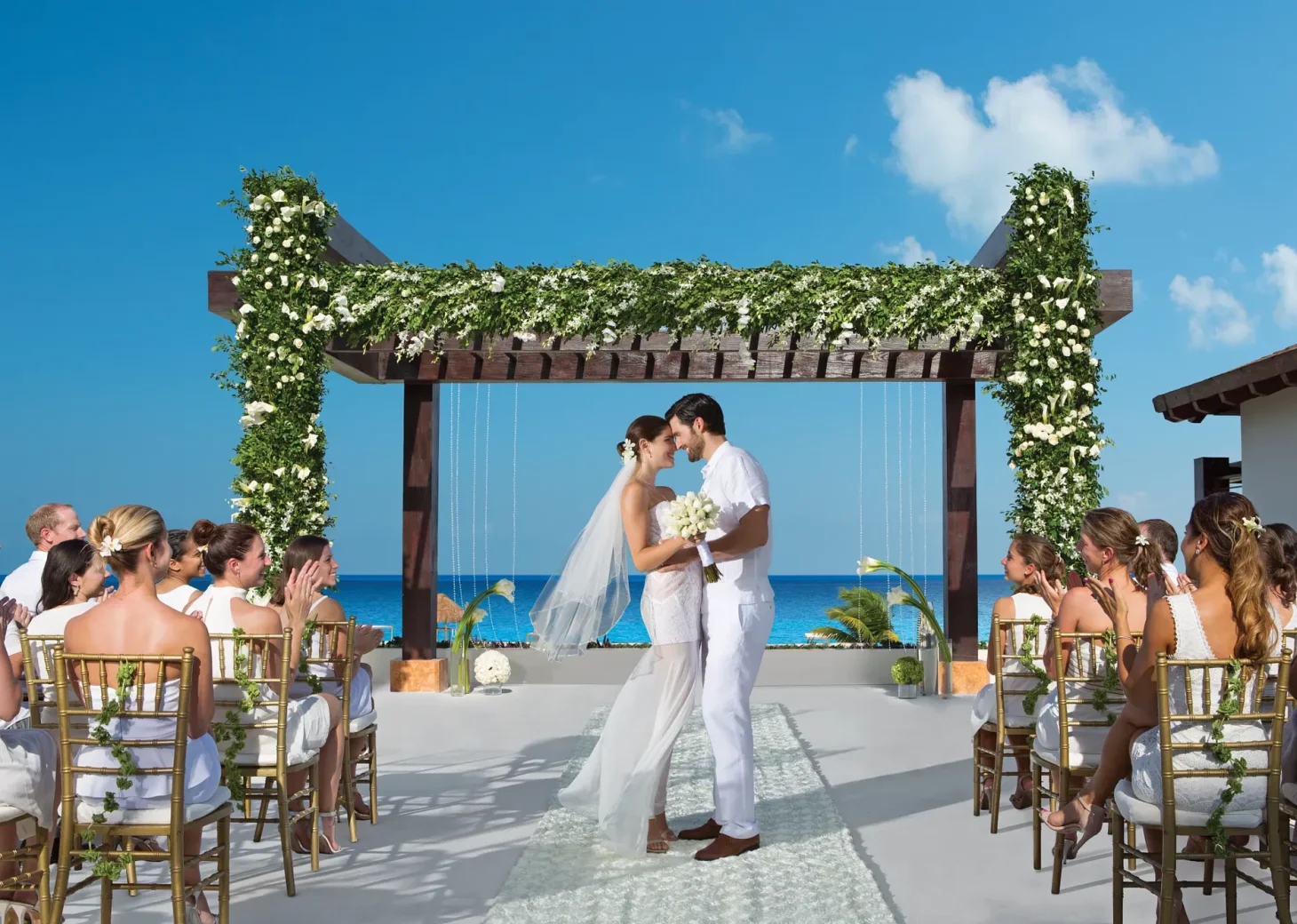 Couple at Secrets Playa Mujeres Golf & Spa Resort Wedding gazebo venue