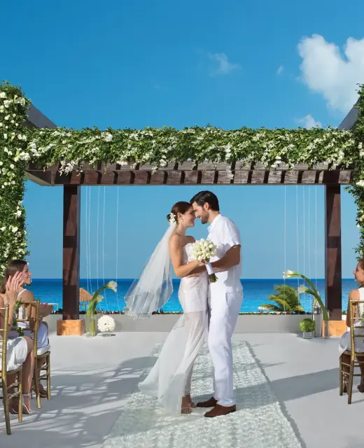 Couple at Secrets Playa Mujeres Golf & Spa Resort Wedding gazebo venue